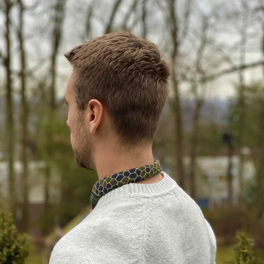 This rattlesnake-inspired bandana captures the spirit of the Old Southwest in tones of dusty sage, grey, and brown.